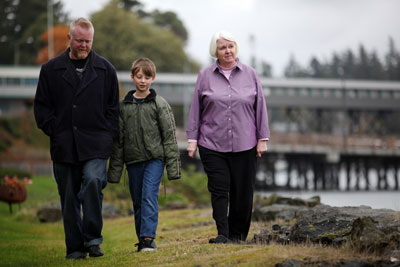 Florrie, Ted, and Sharky Munat by Puget Sound